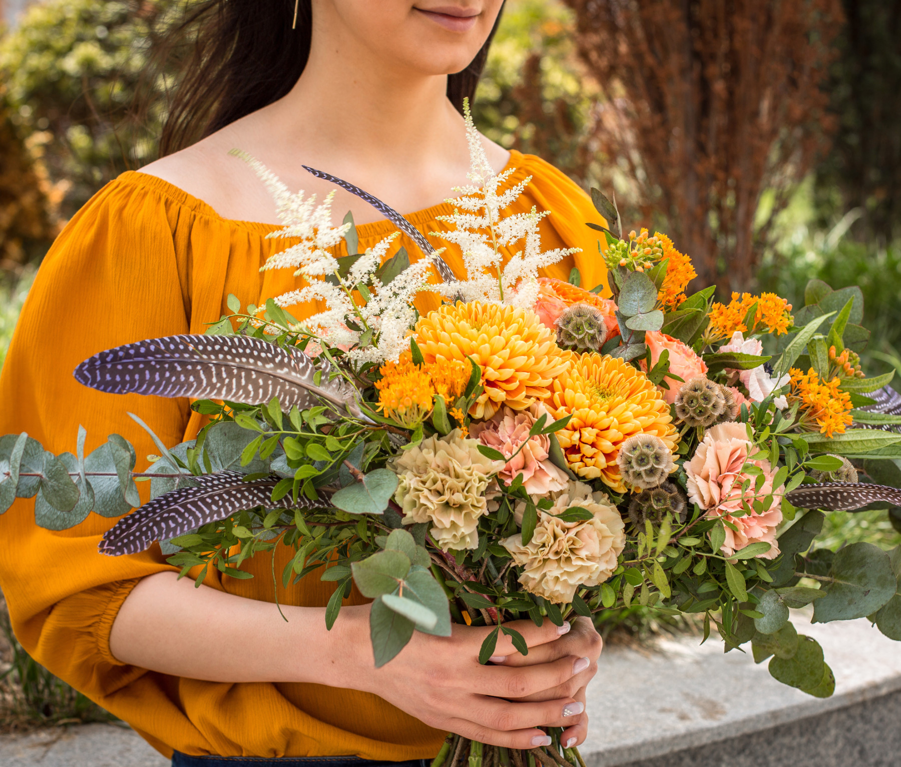 beautiful summer flowers in girl hands